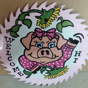 Welcoming Pig on Saw Blade